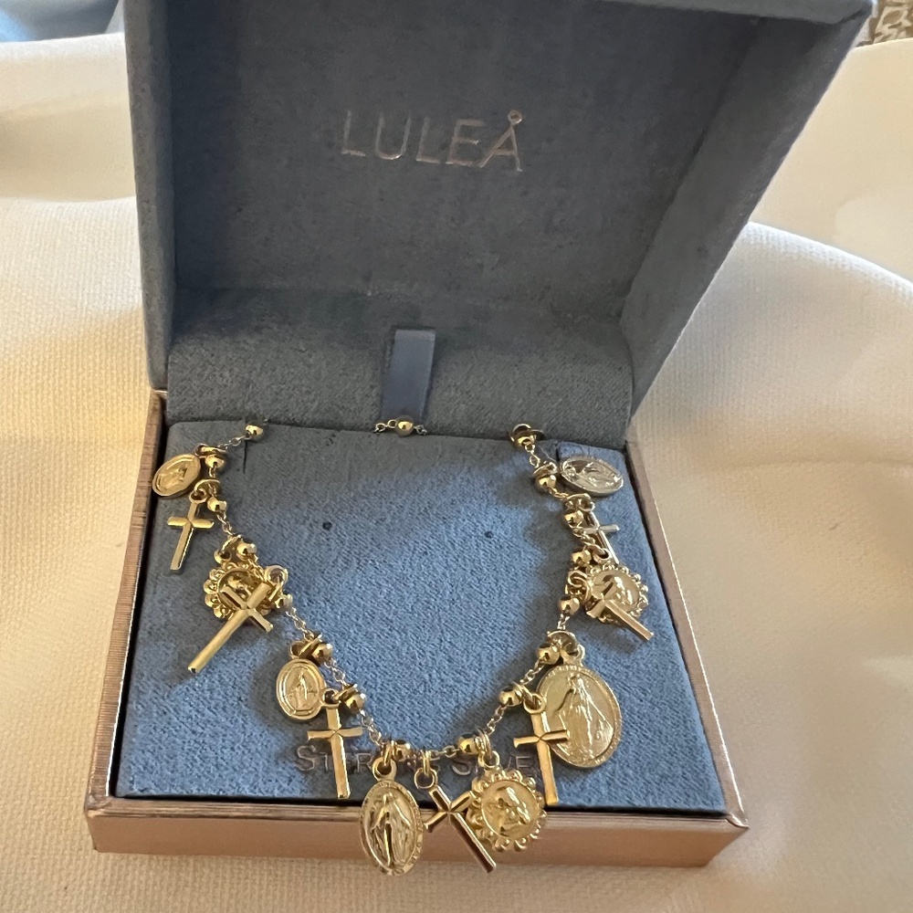 Lulea saints charm necklace